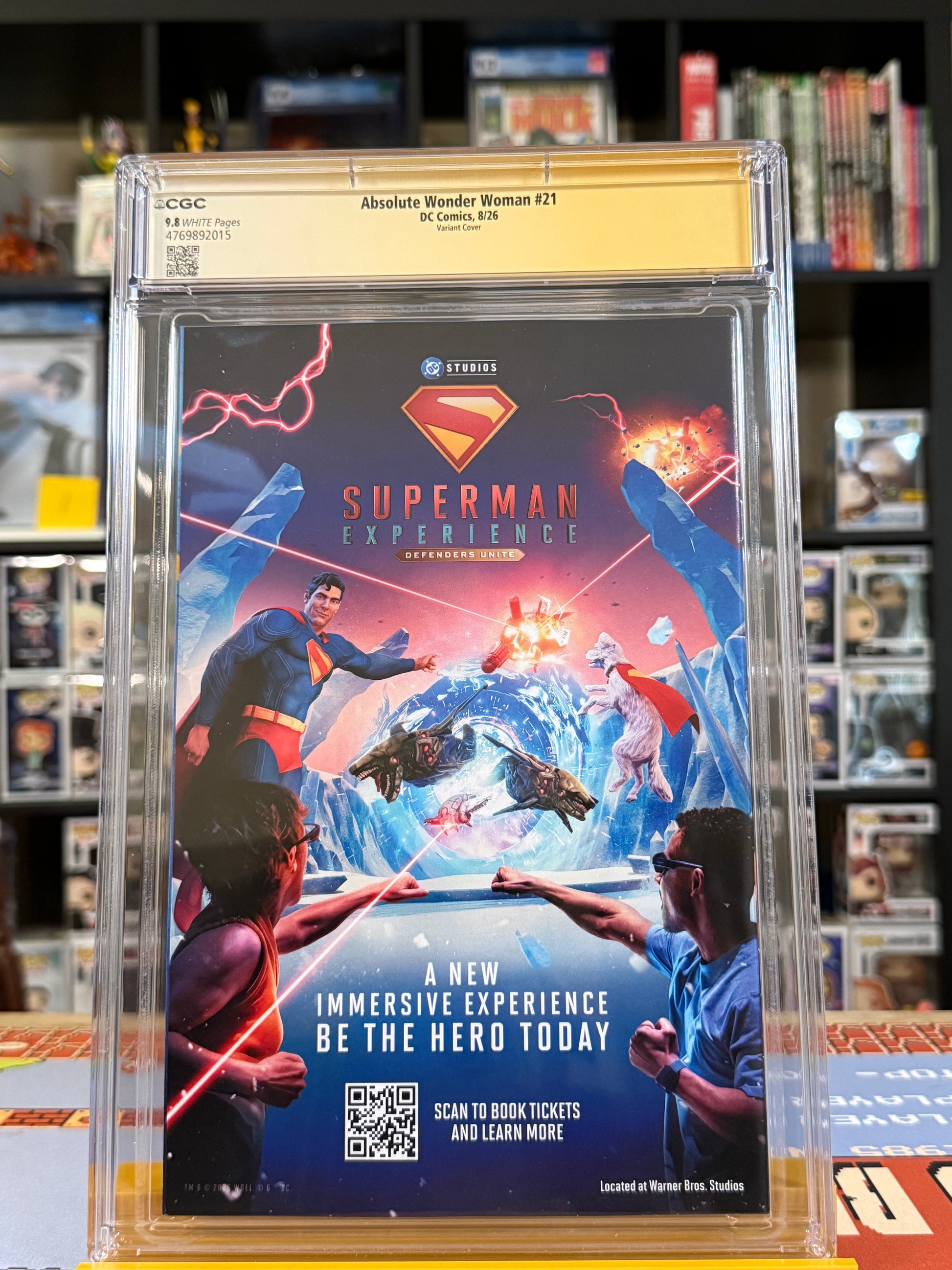Absolute Wonder Woman #21 Cover B David Nakayama Connecting Card Stock Variant, CGC Signature Series 9.8 Yellow Label, signed by David Nakayama, featuring Wonder Woman wielding her massive sword against an orange-lit city skyline,