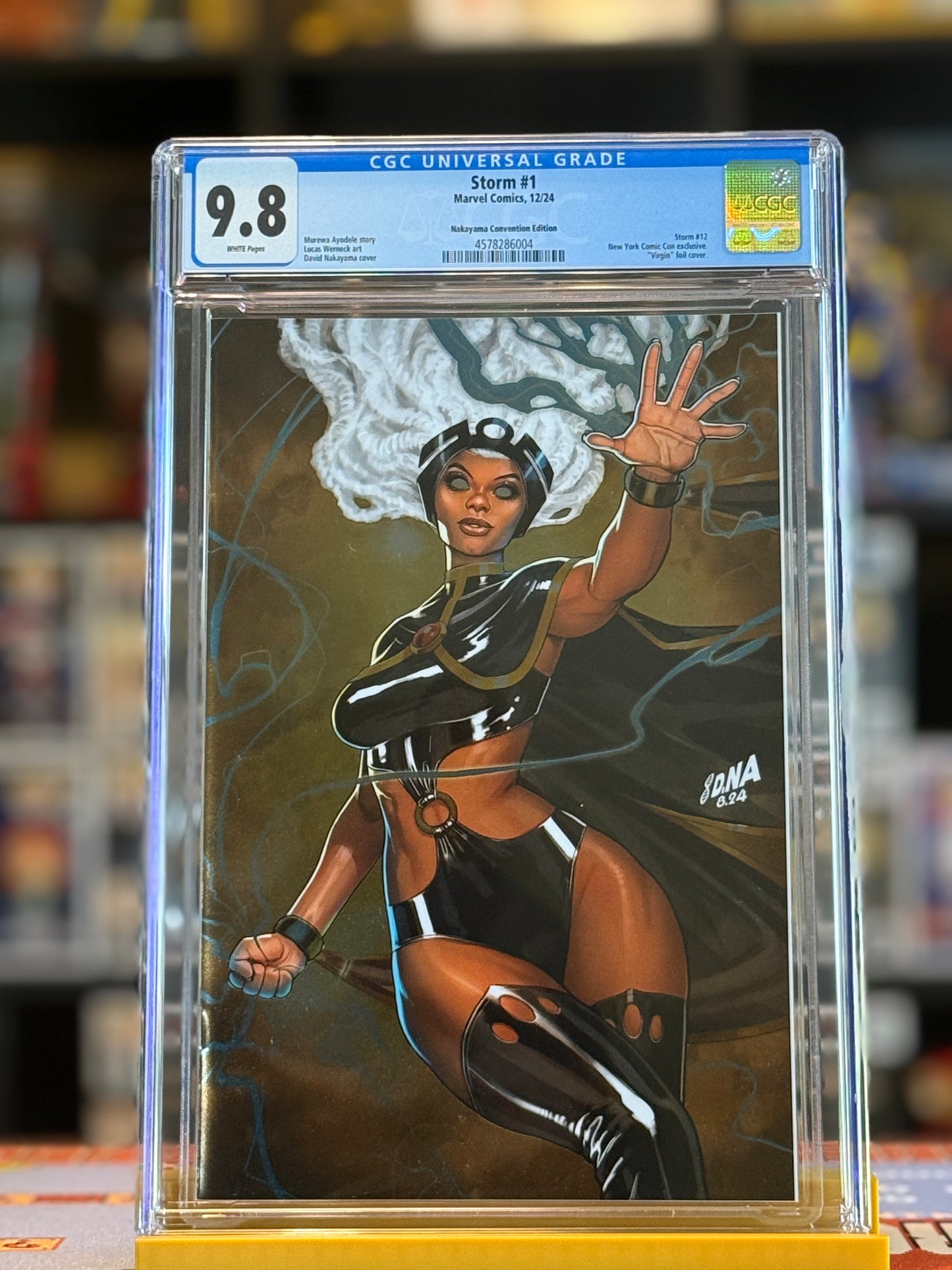 CGC 9.8 graded Storm #1 NYCC 2024 Virgin Foil Variant featuring David Nakayama’s artwork of Storm in a powerful dynamic pose on a metallic foil background.
