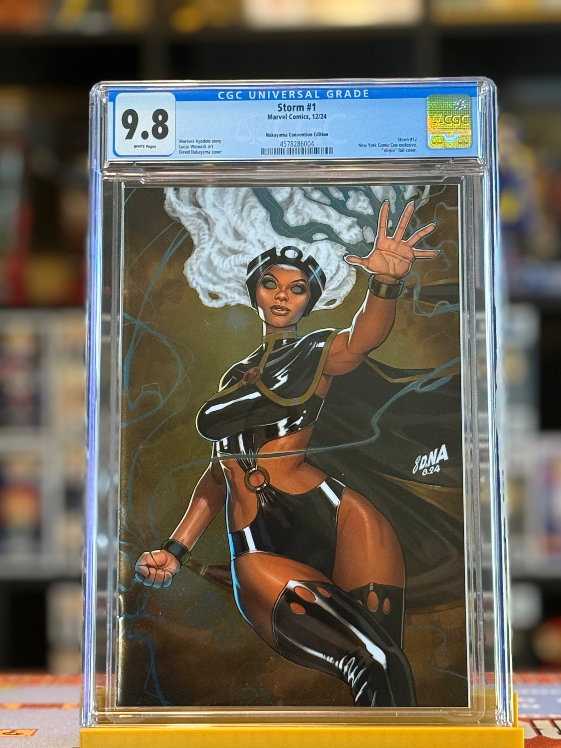 CGC 9.8 graded Storm #1 NYCC 2024 Virgin Foil Variant featuring David Nakayama’s artwork of Storm in a powerful dynamic pose on a metallic foil background.